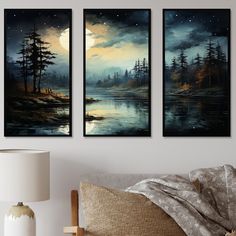 two paintings on the wall above a bed with a night sky and trees in the background