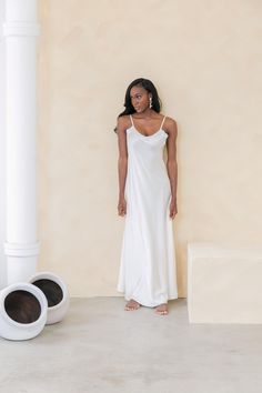 💎 D E T A I L S 💎 Our Silky Satin Slip is the perfect complement to our bridal robe or a stunning piece on its own. Designed in a soft ivory white, this slip exudes elegance and luxury. With adjustable straps for a custom fit, it ensures both comfort and style on your special day. Choose between two lengths--short for a flirty, effortless look or floor-length for timeless sophistication. Ideal for wedding-day prep, bridal photos, or even your honeymoon, this satin slip is a versatile wardrobe essential. 💎 S H I P P I N G . & . P R O C E S S I N G 💎 Standard Processing: 3-5 days Shipping: 3-7 days via USPS Need it rush? We are happy to help! Just convo us! 🛑S T O R E  .  P O L I C I E S 🛑 For Frequently Asked Questions, and detailed Store Policies, Please See below. Solid V-neck Slip Dress For Wedding Night, White Slip Dress With Built-in Bra For Night Out, White V-neck Slip Dress For The Beach, White V-neck Slip Dress With Delicate Straps, White Slip Dress With Built-in Bra, Slip Dress Lace, Lingerie Gown, Long Slip, Bridal Robe