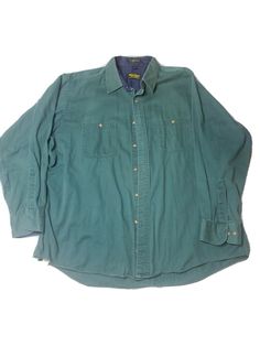 Vintage USA made OSHKOSH B'GOSH camp shirt. 100% Cotton. Hunter Green. Size XL. Shirt is in pre-owned condition with some wear on the fabric that can be seen in the photos. Any questions feel free to ask. Payment must be received within 3 days of end of auction. Thank you and happy bidding. Camp Shirts, Camp Shirt, Vintage Usa, Camping Shirt, Hunter Green, Denim Button Up, Button Up Shirts, Auction, Thank You