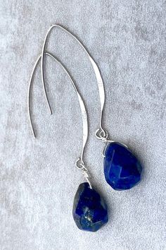 Faceted blue lapis lazuli drops suspended from 925 sterling silver ear wires. LENGTH: 2.1 inches - 5,3 cm - 5 gr. each Drops : 13 x 11 mm MATERIALS: 925 sterling silver Lapis lazuli: Encourages self-awareness, allows self-expression and reveals inner truth, stimulates objectivity, clarity and encourages creativity. Birthstone: September DELIVERY: All jewelry is shipped in a working day with registered mail Tracking available Express shipping is available for UK only Free gift box with every purc Modern Dangle Threader Earrings As Gift, Handmade Sterling Silver Linear Earrings For Gifts, Handmade Sterling Silver Linear Earrings Gift, Everyday Sterling Silver Long Drop Jewelry, Modern Teardrop Linear Earrings As Gift, Modern Teardrop Linear Earrings For Gift, Sterling Silver Long Drop Earrings As Gift, Everyday Sterling Silver Drop Jewelry, Modern Sterling Silver Teardrop Jewelry