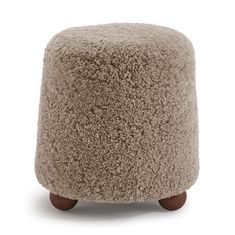 the foot stool is made out of sheepskin