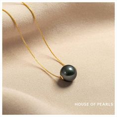 Tahitian Pearl Floating Pendant #baroquepearls #pearlset #pearlsformen #menspearls #PearlChoker #tahitianpearls #tahitianpearlsformen #houseofpearlsoffical #blackpearls #pearls Elegant Tahitian Pearl Jewelry With Round Beads, Elegant Round Tahitian Pearl Necklace, Elegant Single Strand Tahitian Pearl Necklace, Luxury Black Tahitian Pearl Necklaces, Elegant Tahitian Pearl Necklace With High Luster, Formal Black Tahitian Pearl Necklaces, Elegant Tahitian Pearl Drop Necklace, Elegant Tahitian Pearl Chain Jewelry, Elegant Gold Tahitian Pearl Necklaces