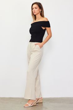 Defined by foldover styling, this off-shoulder top hugs the figure in a soft rib knit. A simple, feminine piece that can be styled with jeans, wide-leg trousers, skirts, anything. •Off-shoulder design •Foldover neckline Item Number: 45591 70% VISCOSE 30% POLYESTER Vacation Dresses Casual, Wedding Guest Dress Trends, Casual Wedding Dress, Ribbed Knit Top, Sweater Sale, Off Shoulder Tops, Trending Dresses, Fashion Tops, Wide Leg Trousers