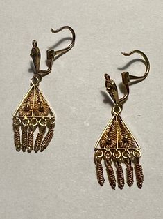 Pristine condition handmade filigree 22K yellow gold dangle earrings Hinged French ear wires hook in front Earring length is 1 1/2" by 7/16" at the widest point Gold Dangle Earrings, Gold Earrings Dangle, Ear Wires, Hinges, Timeless Elegance, Dangle Earrings, Yellow Gold, Thing 1, Yellow