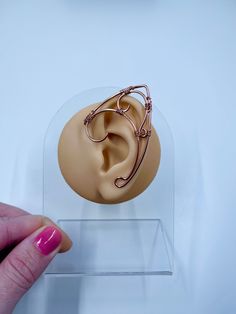 Wire wrapped ear cuffs that come in a set of two, one for each ear.  Made using bendable jewelry wire, the back bar can be bent and shaped to fit any ear size for a comfortable fit.  Handcrafted ear cuffs help bring out your inner elf ️️  ✨FAQ✨ How soon can I get my cuffs? My normal free shipping included with your order will take between 3 and 5 business days to get to you once shipped out. If you would like to add on the additional expedited shipping to your cart, then yes you can get this qui Adjustable Metal Hypoallergenic Ear Cuff, Adjustable Hypoallergenic Metal Ear Cuff, Adjustable Hypoallergenic Ear Cuff As Gift, Adjustable Metal Ear Climbers As Gift, Adjustable Ear Cuff For Pierced Ears As Gift, Adjustable Metal Ear Climbers Gift, Adjustable Metal Ear Climbers With Ear Wire, Adjustable Spiral Ear Cuff, Handmade Adjustable Fantasy Ear Cuff