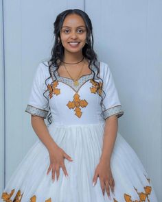 The Habesha dress, also known as Habesha Kemis, is a gorgeous example of Ethiopian traditional dress. This stunning wedding dress is adorned with sparkling beads, showcasing intricate craftsmanship and the rich cultural heritage of Ethiopia. Material Cotton Menen Thread Estimated delivery : 2 weeks to 3 weeks Contact WhatsApp +1(304)-306-2784Email: contact@ethiopian.store Ethiopian Wedding Dress, Ethiopian Wedding, Ethiopian Traditional Dress, Habesha Dress, Habesha Kemis, Wedding Dresses Simple, Traditional Dress, Pitcairn Islands, British Indian