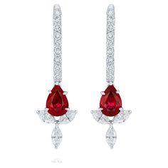 Elegant and exquisitely detailed 18 Karat White Gold Earring , center set with 1.22 Cts .Pear Shape Ruby Burma and micro pave set Diamonds, weighing approx. 0.65 Cts Beautifully Hand crafted in 18 Karat White Gold. Stone Detail: Ruby Burma: 6x4MM Stone Weight: Ruby Burma: 1.22Cts Diamond: GH/SI Total Diamond Weight: 0.65Cts The Bling Ring, White Gold Earring, High Jewellery, Diamond Earring, Vs Diamond, Ruby Earrings, Ruby Jewelry, White Gold Earrings, Gold Stone