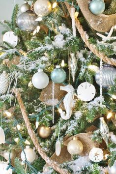 a christmas tree decorated with ornaments and lights