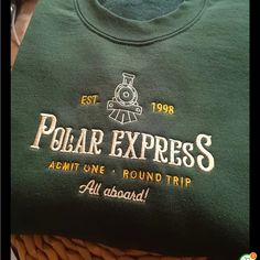 Deep Green Polar Express Themed Embroidery Crew Neck Ribbed Collar, Cuffs & Hem Roomy So Soft Polar Express Christmas, Crewneck Vintage, Christmas Crewneck, Meaningful Art, Polar Express, Embroidery Sweatshirt, Personalized Embroidery, Custom Sweatshirts, Sweatshirt Christmas