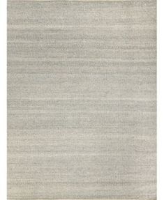 an area rug with grey and white stripes on the bottom, in front of a white background