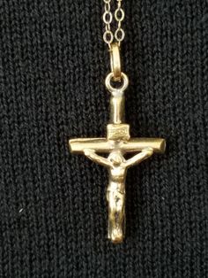 "This vintage Sterling Silver Cross Pendant Necklace features Jesus on the Cross. The cross is in a Gold Color but tested positive for Silver and the chain is marked and also tested. The Cross is from the 1960's but it is still in great vintage condition and will arrive in a gift box with FREE SHIPPING. Chain measures: 18 1/2\"L Cross measures: 1 1/4\"L X 5/8\"W Material: STERLING Silver Hallmark: STERLING Gift Box FREE SHIPPING" Vintage Cross Necklace With Hallmark, Vintage Crucifix Cross Necklace As Gift, Vintage Crucifix Cross Necklace Gift, Vintage Hallmarked Cross Necklace, Vintage Cross Necklace As Gift, Vintage Cross Necklace Collectible, Vintage Gold Cross Necklace For Gift, Vintage Yellow Gold Cross Necklaces, Vintage Yellow Gold Cross Necklace