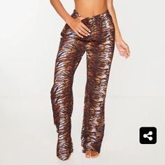 Brown Zebra Print Beach Pants Brown Bottoms For Night Out In Summer, Brown Pants For Night Out In Summer, Brown Pants For Summer Night Out, Chic Brown Pants For Beach, Casual Tiger Print Bottoms For Summer, Casual Summer Bottoms With Tiger Print, Summer Party Pants In Brown, Summer Party Brown Pants, Chic Brown Beach Pants