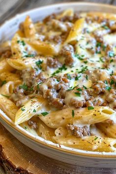 This Creamy Ground Beef Alfredo Pasta is a quick and easy meal ready in just 30 minutes! Perfectly seasoned ground beef combined with a rich and cheesy Alfredo sauce over tender fettuccine. It’s the ideal dinner for busy nights when you need something satisfying and flavorful. Save this recipe for your next weeknight meal and share it with friends! Ground Beef Recipes With Heavy Cream, Hamburger With Alfredo Sauce, Creamy Ground Beef Alfredo Pasta, Burger Pasta Recipes, Creamy Beef And Bow Tie Pasta, Ground Beef Alfredo Pasta, Beef Alfredo Pasta, Ground Beef Alfredo, Beef Alfredo