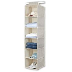 an over the door hanging closet organizer with four shelves