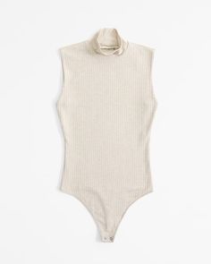 Women's Wide Rib Mockneck Bodysuit | Women's Tops | Abercrombie.com Stretch Ribbed Bodysuit With High Neck, Stretch Ribbed High Neck Bodysuit, Solid Ribbed High Neck Bodysuit, Solid Ribbed High-neck Bodysuit, Turtleneck Bodysuit For Spring, Spring Ribbed High Stretch Bodysuit, Casual Turtleneck Bodysuit For Spring, Rib Fabric, American Clothing