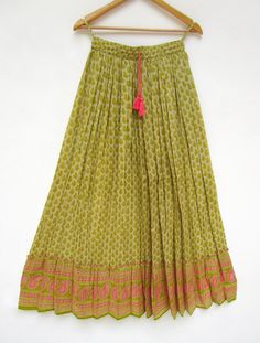 "ITEM DESCRIPTION greenery geometrical printed women wear travel look skirts - broomstick style summer boho skirts Material: 100% cotton voile soft crinkled fabric Length: - 38 inch long Waist :-28.00 inch full (14 inch half) 28 inch relaxed can stretch up to 50 inch Size: free size (fit to all) PRODUCT NAME: - Long Women Maxi skirts Ladies Vintage Long skirts Company Return Policy: Please write for more information to my email directly CHOOSE \"ASK SELLER QUESTION \" payment policy:- we accepts Green Cotton Lined Maxi Skirt, Green Cotton Maxi Skirt With Lining, Green Flowy Cotton Maxi Skirt, Flowy Green Cotton Skirt, Green Cotton Tiered Skirt, Traditional Green Skirt For Spring, Bohemian Green Pleated Skirt, Green Bohemian Long Skirt, Bohemian Cotton Maxi Skirt For Festivals