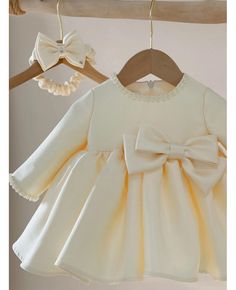 Get 10% off now! Buy light champagne satin toddler flower girl dress with long sleeves at cheap price online. Free stable shipping and pro custom service since 2009. Elegant Fitted Princess Dress, Elegant Solid Color Princess Dress For Dress-up, Elegant Long Sleeve Baptism Dress For Formal Occasions, Elegant Long Sleeve Princess Dress For First Communion, Cream Long Sleeve Dress For First Communion, Elegant Long Sleeve Princess Dress For Wedding, Cream Princess Dress For Pageants, Fitted Cream Princess Dress For Pageants, Fitted Cream Princess Dress For Pageant