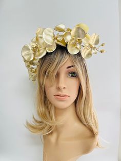 Handmade Gold Fascinator, Champagne Gold orchids adorn this flower crown fascinator on a headband wrapped in Champagne Gold Ribbon. Lightweight and easy to wear, a beautiful head piece will compliment your outfit One size fit all  Please see photos for all details of headpiece  Free postage Australia wide Handmade in my studio at Tamborine Mountain, Gold Coast, Queensland, Australia Click link to check out my other items https://www.etsy.com/au/shop/MichelleFascinator Gold Flower Crown, Gold Fascinator, Mini Hats, Gold Orchid, Pearl Bridal Headband, Headband Wrap, Fascinator Headband, Silk Headband, Wedding Fascinators