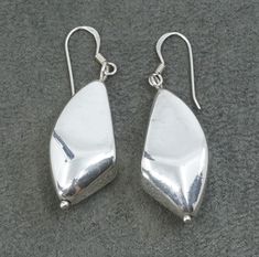 Vintage sterling silver handmade earrings, solid 925 silver nugget shaped drops, stamped 925 Thailand, minimalist, modernist Contemporary Silver Drop Earrings, Contemporary Silver Drop Jewelry, Contemporary Teardrop Sterling Silver Earrings, Contemporary Teardrop Silver Jewelry, Minimalist Teardrop Hallmarked Earrings, Minimalist Hallmarked Teardrop Earrings, Silver Sterling Teardrop Earrings With Polished Finish, Contemporary Everyday Sterling Silver Earrings, Silver Modernist Earrings For Formal Occasions