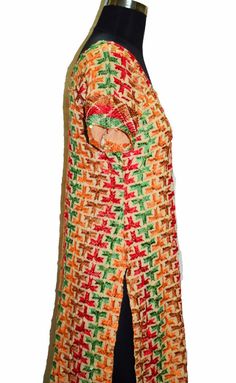 "Item Description : multi color cotton hand embroidered bagh phulkari top. Floral design with green/orange/red/black/white thread work. Top with remarkable embroidery brighten the look of wearer and adds up charm to their outfits. Awesome work. This designer top with floral design will make you look smart & elegant. Team it with leggings for comfort & style. Pakistan Bagh Phulkari : Over time, special phulkari patterns known as Bagh emerged in Punjab. In typical phulkari, embroidery is u Multicolor Straight Kurta With Mirror Work, Multicolor Chanderi Kurta With Mirror Work, Multicolor Kurta With Mirror Work For Navratri, Multicolor Mirror Work Kurta For Navratri, Multicolor Kurta With Mirror Work For Festivals, Traditional Multicolor Kurta With Mirror Work, Multicolor Straight Kurta With Dori Work, Green Handwork Kurta For Festivals, Cotton Traditional Wear With Multicolor Embroidery And Dori Work