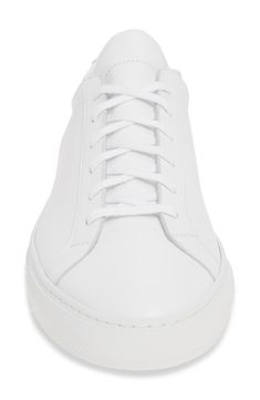 A streamlined, classic sneaker that doesn't shout, this Italian-leather walkabout features monochromatic coloring that keeps it as low-key as it is luxe. Style Name:Common Projects Original Achilles Sneaker (Men). Style Number: 5636676. Classic Low-top Sneakers With Contrast Sole, Classic White Low-top Sneakers, Classic White Sneakers With Vulcanized Sole, Classic Sneakers With Rubber Sole And Plain Toe, Classic High-top Sneakers, Classic White Everyday Sneakers, Classic High-top Custom Sneakers With Perforated Toe Box, Classic High-top Custom Sneakers With Perforated Toe, Classic Everyday Custom Sneakers With Contrast Sole