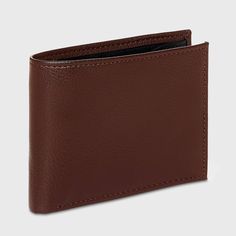 Bring convenience to carrying your money and cards with this Slimfold Wallet from Goodfellow & Co™. This bi-fold wallet features multiple card slots, ID pocket and a bill compartment, while the slimfold design lends it a non-bulky feel, making it easier to slip in the front or rear pockets of your trousers. Best of all, it features RFID blocking that helps prevent your cards and IDs from digital theft. Showcasing a faux-leather finish in brown, it's sure to bring classic style to your everyday a Classic Brown Trifold Wallet For Formal Occasions, Brown Trifold Wallet With Rfid Blocking For Business, Brown Bifold Wallet With Rfid Blocking, Brown Rfid Blocking Trifold Wallet For Business, Classic Bifold Wallet With Coin Pocket, Classic Brown Trifold Wallet With Coin Pocket, Formal Brown Trifold Wallet With Rfid Blocking, Brown Rfid Blocking Trifold Wallet For Formal Use, Classic Brown Trifold Wallet With Interior Card Slots