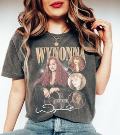 The Judds Country Concert Shirt, 90s Country Tee, 90s world tour t shirt, Graphic Wynona fans shirt ABOUT MATERIAL: Comfort Colors® 1717 Made with medium fabric (6.1 oz/yd² (206.8 g/m consiting of high quality, 100% ring-spun US cotton for long-lasting comfort. The relaxed fit keeps the wearer comfy in both casual and semi-formal settings while the crew neckline delivers that classic, neat style which makes it perfect for accessorizing. What's more, the pre-shrunk fabric ensures a consistently g The Judds, Country Concert Shirts, 90s Country, Country Tees, Country Concerts, Country Concert, Concert Shirts, Fan Shirts, Comfort Color