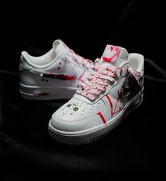 The White Voorhee Air Force 1 is a unique, one-of-a-kind sneaker, featuring a white base and signature Air Force 1 silhouette and machete mask panel. The sneaker is styled with Shoe Baker's signature &  red drip, plus a horror-themed twist that makes it impossible to look away, This sneaker is sure to make a statement. Base shoe will be ordered from Nike.com or similar venders that carry the authentic Nike Air force 1. Turnaround time typically take 2-4 weeks from the initial date of purchase. Custom White Sneakers With Rubber Sole, Custom White Lace-up Sneakers, White Custom Leather Sneakers With Waterproof Paint, White Leather Custom Sneakers With Waterproof Paint, Custom Low-top Sneakers With Red Sole, White Waterproof Custom Lace-up Sneakers, Custom High-top White Sneakers With Waterproof Paint, White High-top Custom Sneakers With Waterproof Paint, Custom White Sneakers With Waterproof Paint