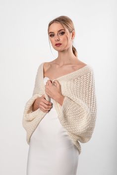 Express Shipping with DHL and FedEx in 2-5 days! Please, write your phone number and a courier will contact you to arrange the delivery time. Alpaca grey sweater, handmade alpaca cardigan, coconut grey wrap, coconut sweater wrap, alpaca oversized sweater, Beautiful hand knitted sweater-bolero is made in a very soft and warm alpaca and merino wool yarn. The shrug is very soft and not itchy. Color: light grey. Also you can choose this sweater in light blue or light ivory color. Fiber: alpaca, meri Wedding Sweater, Alpaca Shawl, Bridal Shrug, Mohair Scarf, Sweater Wrap, Bolero Wedding, Alpaca Cardigan, Shrugs And Boleros, Bridal Wrap