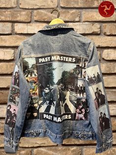 Show off your love for The Beatles with this one-of-a-kind vintage denim jacket! This unique piece features a stunning collage of The Beatles graphics, surrounded by various photos from different eras of her career. Perfect for The Beatles fans who want to make a statement, this jacket combines retro vibes with a modern, artistic twist. Crafted from authentic vintage denim, this jacket has that perfectly worn-in look and feel. It's an ideal choice for concerts, festivals, or any casual day when Vintage Graphic Print Denim Jacket For Spring, Vintage Denim Jacket With Graphic Print For Spring, Vintage Denim Outerwear With Graphic Print, Vintage Denim Jacket With Graphic Print For Streetwear, Retro Denim Jacket With Graphic Print For Streetwear, Vintage Denim Jacket With Graphic Print, Vintage Music Icon, Beatles Collage, The Beatles Art