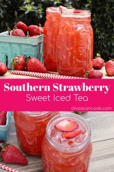 two jars filled with strawberries sitting on top of a wooden table