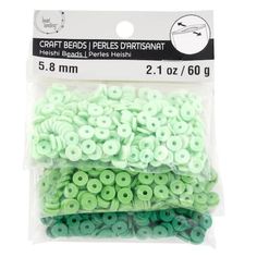 craft beads in green and white plastic bags on a white background with the words craft beads per