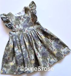 "\"Eliza\" style party dress in Lewis & Irene Bluebell Wood floral fabric - Hare & Hedgehog woodland. Age 3 100% cotton Measurements : Waist : 56cm Shoulder to hem : 52cm A little bit more about my \"Eliza\" style : Eliza is a modern twist on a pinafore dress.  It has a fully lined bodice, open sides (hence no chest measurement), pretty ruffle sleeve cap and a full swirly twirly skirt.  French seams wherever possible giving a smooth finish and a comfortable wear for your little one.  Colours can Style Party Dress, Twirly Skirt, Eliza Dress, Style Party, Dress Yellow, French Seam, Pinafore Dress, Toddler Girl Dresses, Little Dresses