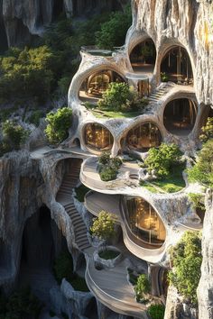 an unusual house built into the side of a cliff with trees growing out of it