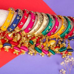 Elevate your style with our exquisite Indian Silk Thread Bangles. Expertly handcrafted with luxurious silk thread and adorned with stunning Kundan bangles, these ethnic bracelets add a touch of elegance to any outfit. Perfect for Indian weddings, these assorted Kangan with Latkan are the epitome of fashion and luxury. Free size for a comfortable fit. Material: Plastic, Silk Thread and Kundan Size: Designed as free size, these bangles offer versatility and ease of wear for women of different wris Traditional Silk Thread Bangle Bracelets, Blue Silk Thread Bangles, Festive Silk Thread Bangle Jewelry, Diwali Silk Thread Bangle, Diwali Silk Thread Bangle Jewelry, Rakhi Greetings, Holi Gift, Bangle Ceremony, Kundan Bangles