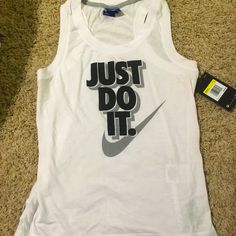 New With Tags Nike Workout Tank Top. Light And Breathable! Modern Black And White Design. Just Do It! New. Never Worn! Can Fit Xs-S. White Casual Tank Top For Workout, Casual White Nike Tank Top, Nike White Tank Top For Gym, White Nike Tank Top For Gym, White Casual Nike Tank Top, Cheap Nike Tank Top, White Letter Print Tank Top For Gym, White Sleeveless Top With Logo Print, White Logo Print Tank Top For Streetwear