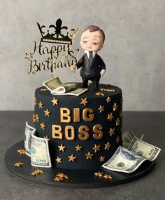 a birthday cake decorated with money and a man in a tuxedo on top