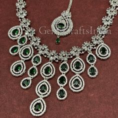 BEAUTIFUL AMERICAN DIAMOND NECKLACE SET *  Main Color : Green * Skin Friendly : This Product does not contain harmful constituents. Anti-allergic safe for Skin. * Quality : Made from Premium Quality Material. This Product assures to remain in its Original Glory even after several usages.     . Actual Images of item are shown above, Please be aware of the actual colors may vary from the color shown on your screen, as monitor    settings may vary from individual to individual. . Welcome to Our Ets Green Jeweled Bridal Necklace For Wedding, Green Bridal Necklace With Jewels For Wedding, Silver Cubic Zirconia Necklaces For Marriage, Green Crystal Rhinestone Necklace For Wedding, American Diamond Stone-set Necklace For Weddings, Festive Multicolor Multi-stone Bridal Necklace, Bollywood Multi-stone Festive Necklace, Exquisite Hand-set Green Diamond Necklace, Cubic Zirconia Multi-stone Wedding Necklaces