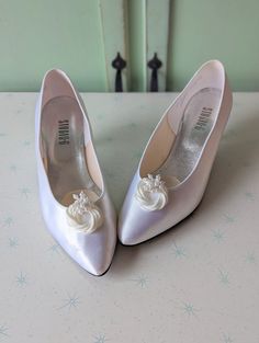 "dreamy white heels size 10 women  satin fabric heels perfect for fancy or for casual good vintage condition  perfect for the bride:) measures: 10.5\"tip to tip (taken from inside the heel) 3.5\"ball 3\" heel Thank YOU and please feel free to ask me any ?s:) Have a lovely day!! xoxo www.etsy.com/shop/retroandme" White Satin Wedding Shoes For Formal Occasions, Formal White Satin Wedding Shoes, White Satin Wedding Shoes With Pointed Toe, White Satin Wedding Heels, Elegant White Satin Wedding Shoes, Vintage 4-inch Heel Wedding Heels, Vintage 4-inch Heels For Wedding, Vintage White Heels For Wedding, Vintage Heels With Pointed Toe For Wedding