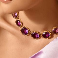 Bold and beautiful, this amethyst and 14 karat yellow gold necklace features approximately 290.00 total carats of oval cut amethyst. This necklace is 17" in length. Reference Code: 34645 Shop other beautiful pieces in our Necklace Collection. For inquiries on the piece please contact: boutique@shsilver.com. Luxury Amethyst Necklace For Formal Occasions, Antique Amethyst Jewelry, Purple Diamond Necklace, Purple Stone Necklace, Shoulder Jewelry, Gold Outfit, Purple Diamond, Royal Dresses, Necklace Collection