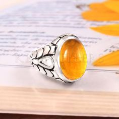 Baltic Amber Silver Mens Ring, Solid 925 Sterling Silver Mens Ring, Handmade Ring, Statement Ring, Cabochon Gemstone Ring, Gift For Him Metrial :-:  Metal :-: 925 Sterling Silver  Gemstone :-: Baltic Amber  Stone Color :-: Yellow Stone Shape :-: Oval  Stone Size :-: 13x18 mm Stone Creation :-: Lab Created Item Weight Approx  :-: 10 Gram  Country/Region of Manufacture :-: India Made In :-: Jaipur Making :-: Jewelry Making Etc. For Wholesale orders or customized order requirements, please message Silver Mens Ring, Ring Man, Amber Gemstone, Sterling Silver Mens Rings, Amber Stone, Yellow Stone, Mens Silver Rings, Mens Ring, Sterling Silver Mens