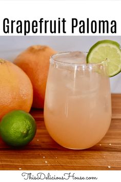 the grapefruit paloma cocktail is garnished with lime