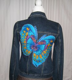 Custom made embellished denim jacket.  Design your dream jacket with appliques and trim of your choice. Embellish it as much or as little as you wish.  I will also use your personal jean jacket and embellish it if you already have the perfect fit and style you like. Men, women, youth and baby sizing available. Fitted Denim Jacket With Custom Embroidery For Fall, Trendy Fitted Denim Jacket With Rhinestones, Fitted Denim Jacket With Custom Embroidery, Denim Jacket Design, Designer Jeans For Women, Embellished Denim Jacket, Embellished Denim, Designer Jeans, Jacket Design