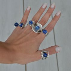 ❀ I made this blue evil eye Ring for you, to make you look elegant. A Long Ring that can fit perfectly to all styles. You will look elegant when you wear this Protection ring. dome evil eye ring stands out with flashy designs. If you have a modern and rebellius style, this luck ring is for you. ❀ It is an Adjustable ring with sterling silver plated matte finish. ❀ All the rings are adjustable in the back. Rings are easy to adjust and would fit fingers size US 4 and up ❀ If you are looking for a Blue Evil Eye Ring Jewelry, Elegant Evil Eye Rings, Adjustable Evil Eye Open Ring Jewelry, Adjustable Open Ring With Evil Eye, Adjustable Open Ring With Evil Eye Detail, Adjustable Evil Eye Ring Jewelry, Evil Eye Ring Jewelry Gift, Elegant Evil Eye Rings As Gift, Nickel-free Blue Open Ring Jewelry