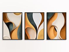 three abstract paintings hanging on the wall