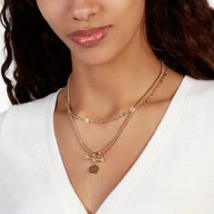 Two is so much better than one. Case in point - our Stella Layering Set. We've paired a simple chain choker with a bold curblink chain toggle pendant necklace for an on-trend look. Rock each on its own or pair them together for double the impact. Available in 14k gold plated brass Stella Pearl Toggle Necklace: Size: 1/2" ; Length: 18" curb chain Simulated 3mm pearl Vivi Necklace: Size: 4mm; Length: 16" with 2" extender Made in the USA With engraving this item is FINAL SALE NOTE - the necklaces i Chic Metal Jewelry With Curb Chain, Chic Metal Necklace With Toggle Clasp, Trendy Double Strand Chunky Chain Necklace, Chic Choker Necklace With Curb Chain, Trendy Double Strand Necklace With Chunky Chain, Chic Metal Toggle Necklace With Adjustable Chain, Chic Metal Necklaces With Toggle Clasp, Trendy Necklace With Chunky Chain For Layering, Trendy Chunky Chain Necklace For Layering