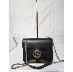 This Authentic Gucci Dollar Calfskin Interlocking G Shoulder Bag Black Is In It’s Good Pre-Owned Condition. The Exterior Is Clean And Beautiful. Interior Is Clean. Gold Hardware. Kindly Note That Picture On Mannequin Is Not Ours But For Size Reference And Fit. Dimensions Length: 8” Width: 2.5” Height: 5.75” Handle Drop: 19” Adjustable Gucci Dollar Calfskin Interlocking, Bags Gucci, Shoulder Bag Black, Gucci Bags, Gold Hardware, Calf Skin, Bag Lady, Gucci, Exterior