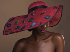 "Here I present this absolutely stunning Large Deep Salmon Coloured Sinamay Hat with Individually Attached Leaves.   It is a free-formed wave shape with navy blue grosgrain edging and a black faux leather head band.  The leaves are a wonderful eclectic mix of burnt orange, purple, blue, green, terracotta and gold colours which sync perfectly.  The crown size is 23\". I can make this to order in the colour and size of your choice. This hat is can be shipped immediately.  For a custom made piece, please allow 21 working days.  Thanks for looking 😊" Large Oval Sinamay Hat, Luxury Fitted Ceremonial Hats, Luxury Orange Hat For Spring, Luxury Sinamay Costume Hat, Multicolor Evening Hats For Summer, Multicolor Summer Evening Hats, Hat Making Ideas, Fascinator Hats Outfit, Stylish Womens Hats