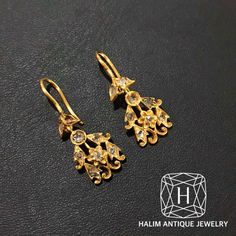 Antique Polki Diamond Chandelier Earrings - Total weight : 3.1 g. - Material : gold - Polki Diamond This Earrings is antique crafted by hand over 60 years. **Ship with DHL insured according to product value for free.** *Please contact us if you have any questions.* ABOUT PERANAKAN JEWELRY Peranakan jewelry is rare and skilfully crafted traditional gold providing a pedestal for Diamond and other precious stones to be mounted on. Each crafted piece holds the mystery of the individual who owns it and embraces an era in Baba history. Peranakan jewelry is fashioned with influences from the Malay Archipelago, Asia, China, Europe, Anglo-Indian, and Victorian England. has a Unique pattern emphasizes naturalness. Often have patterns of animals, flowers, stars on the setting.They are mainly found in Antique Gold Chandelier Earrings Gift, Traditional Gold-plated Chandelier Earrings With Intricate Design, Ornate Gold Danglers With Meenakari, Luxury Antique Gold Chandelier Earrings, Gold Meenakari Chandelier Dangle Earrings, Malay Archipelago, Victorian England, Diamond Chandelier, Diamond Chandelier Earrings