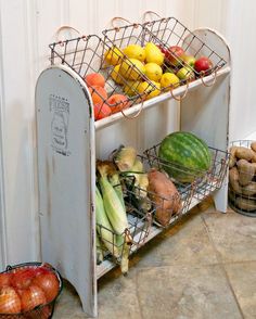 there is a fruit and vegetable stand on the floor